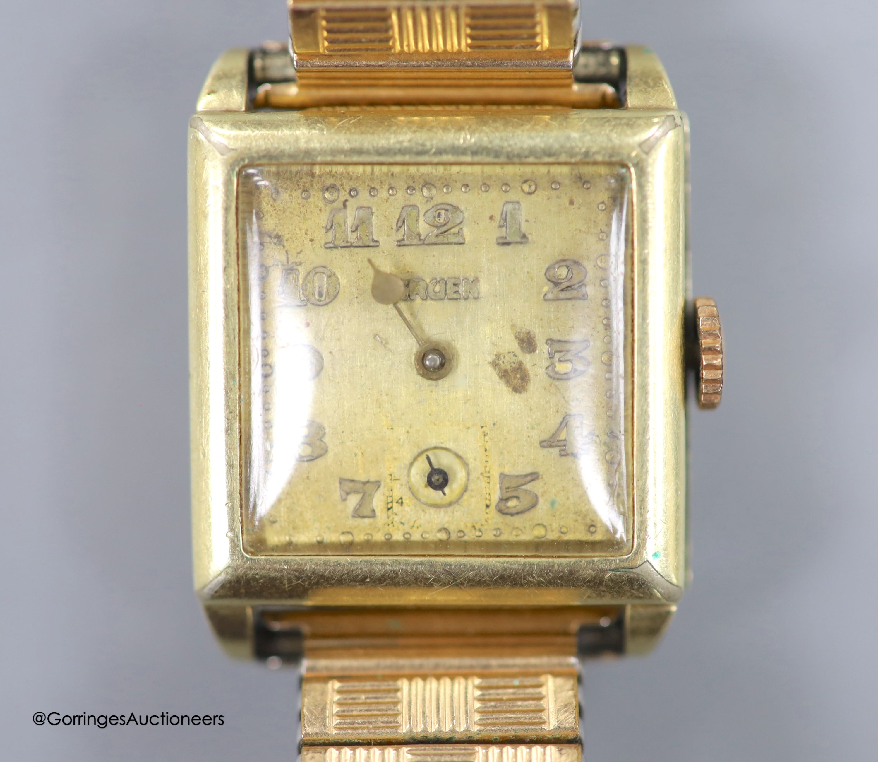 A gentleman's gold filled Gruen manual wind wrist watch, on associated flexible bracelet.